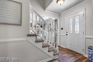 1879 Eastborne Dr, Virginia Beach, VA 23454 - foyer entrance featuring stairs, wood finished floors, and ornamental molding
