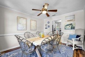 1879 Eastborne Dr, Virginia Beach, VA 23454 - dining area with crown molding, wood finished floors, and ceiling fan
