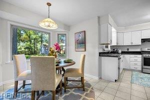 1879 Eastborne Dr, Virginia Beach, VA 23454 - dining space with baseboards and light tile patterned flooring