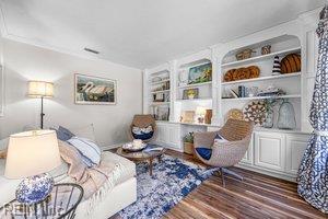 1879 Eastborne Dr, Virginia Beach, VA 23454 - living area with wood finished floors and built in shelves
