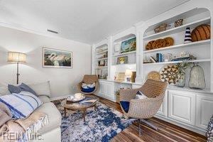 1879 Eastborne Dr, Virginia Beach, VA 23454 - sitting room with wood finished floors and built in features