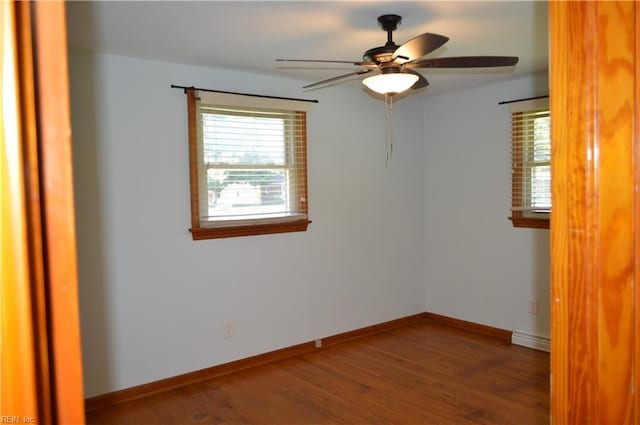 301 Woodbridge Dr, Chesapeake, VA 23322 - empty room featuring healthy amount of natural light, wood finished floors, and ceiling fan
