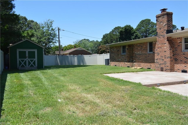 301 Woodbridge Dr, Chesapeake, VA 23322 - view of yard featuring a patio area and a shed