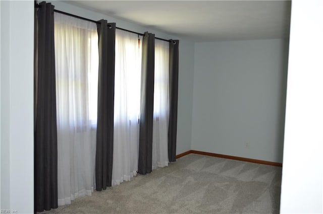 301 Woodbridge Dr, Chesapeake, VA 23322 - spare room featuring light carpet and plenty of natural light