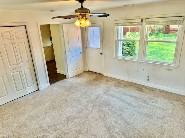 613 N Shore Rd, Norfolk, VA 23505 - unfurnished bedroom with carpet flooring and a ceiling fan