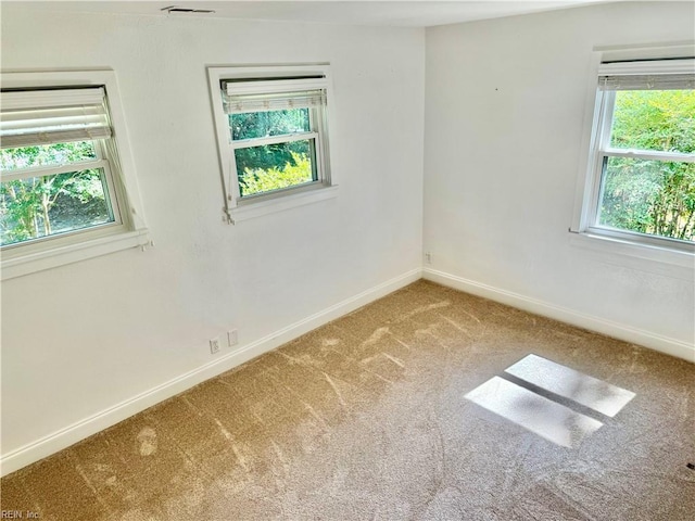 613 N Shore Rd, Norfolk, VA 23505 - spare room featuring carpet floors and baseboards