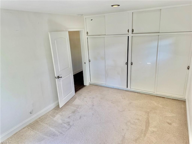 613 N Shore Rd, Norfolk, VA 23505 - unfurnished bedroom featuring light carpet and a closet