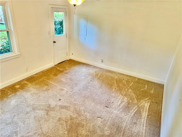 613 N Shore Rd, Norfolk, VA 23505 - carpeted empty room featuring baseboards