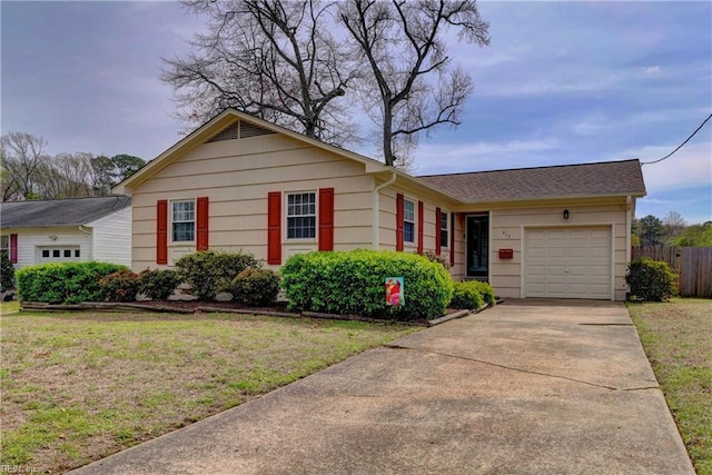 215 Lisbon Dr, Newport News, VA 23601 - ranch-style home featuring a garage and concrete driveway