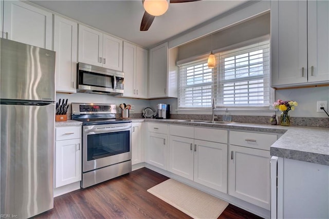 215 Lisbon Dr, Newport News, VA 23601 - kitchen with stainless steel appliances, dark wood-type flooring, and white cabinets
