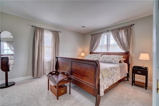215 Lisbon Dr, Newport News, VA 23601 - bedroom featuring multiple windows and light colored carpet