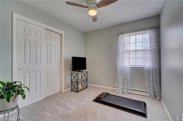 215 Lisbon Dr, Newport News, VA 23601 - exercise room with carpet flooring, ceiling fan, and a baseboard radiator
