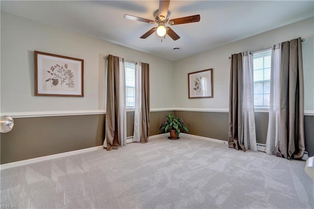 215 Lisbon Dr, Newport News, VA 23601 - unfurnished room with plenty of natural light, a ceiling fan, and carpet flooring