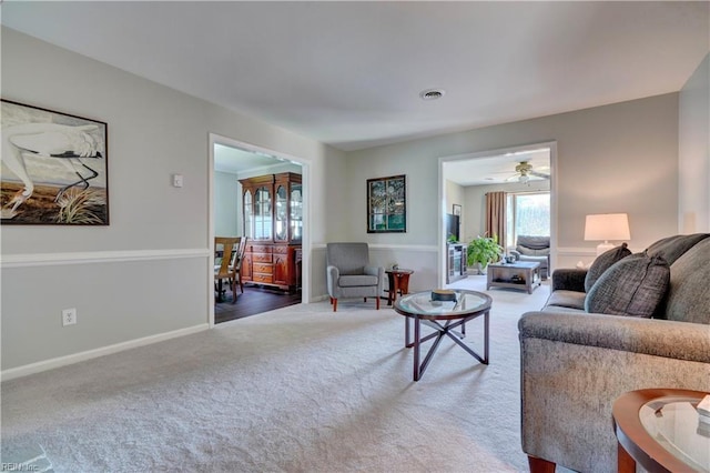 215 Lisbon Dr, Newport News, VA 23601 - living area with carpet, healthy amount of natural light, and ceiling fan
