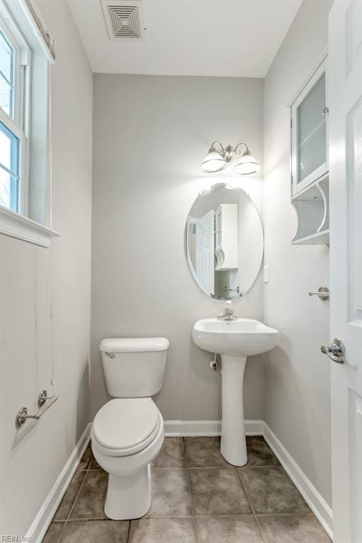 923 Hill St, Chesapeake, VA 23324 - bathroom featuring toilet and tile patterned flooring