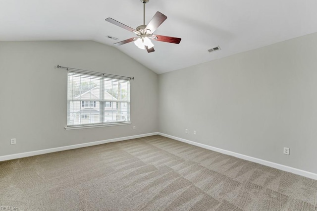 923 Hill St, Chesapeake, VA 23324 - empty room featuring a ceiling fan, vaulted ceiling, and light colored carpet
