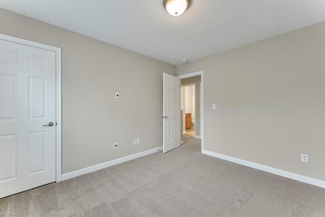923 Hill St, Chesapeake, VA 23324 - unfurnished bedroom with baseboards and light carpet