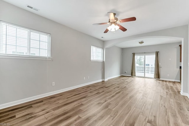 923 Hill St, Chesapeake, VA 23324 - unfurnished room with a ceiling fan, light wood-type flooring, and arched walkways
