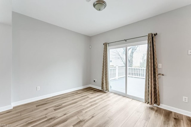 923 Hill St, Chesapeake, VA 23324 - unfurnished room with light wood-style flooring and baseboards