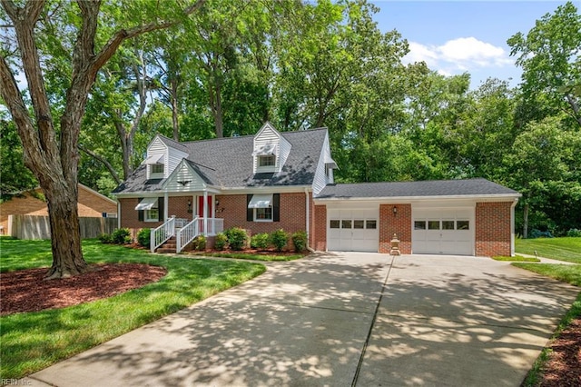 440 N Adventure Trl, Virginia Beach, VA 23454 - new england style home featuring brick siding, concrete driveway, and a garage