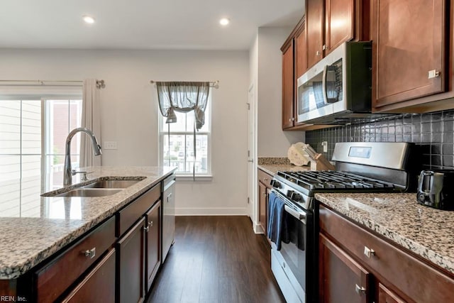 1803 Yardarm Way, Chesapeake, VA 23323 - kitchen featuring stainless steel appliances, dark wood-style flooring, backsplash, light stone countertops, and recessed lighting