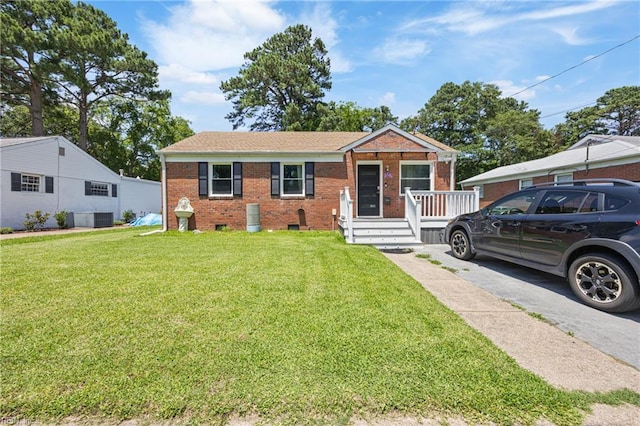 556 Summers Dr, Norfolk, VA 23509 - single story home with brick siding and a front yard
