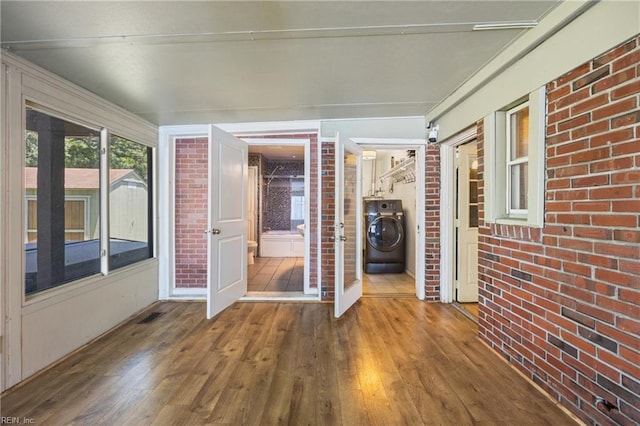 556 Summers Dr, Norfolk, VA 23509 - unfurnished sunroom with washer / dryer