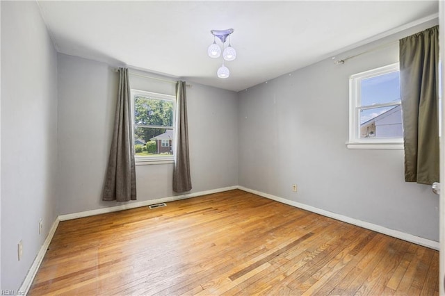 556 Summers Dr, Norfolk, VA 23509 - unfurnished room with hardwood / wood-style flooring and baseboards