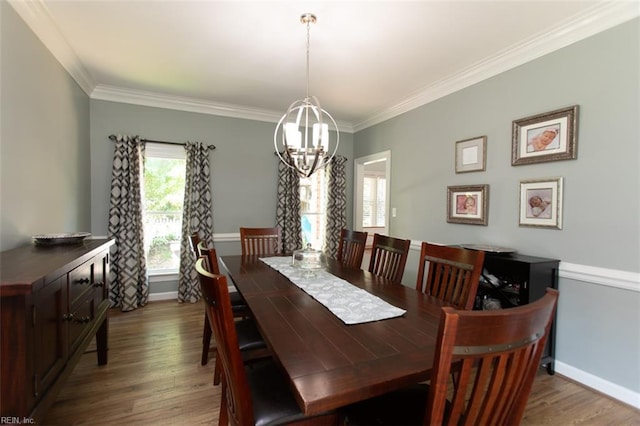 108 Sunrise Bluff Ct, Smithfield, VA 23430 - dining space featuring a chandelier, crown molding, and wood finished floors