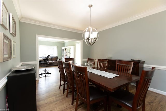 108 Sunrise Bluff Ct, Smithfield, VA 23430 - dining room with ornamental molding, wood finished floors, and a chandelier