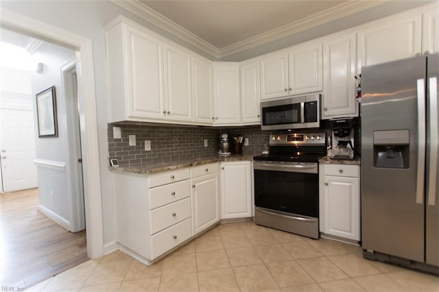 108 Sunrise Bluff Ct, Smithfield, VA 23430 - kitchen with stainless steel appliances, crown molding, white cabinets, backsplash, and stone countertops