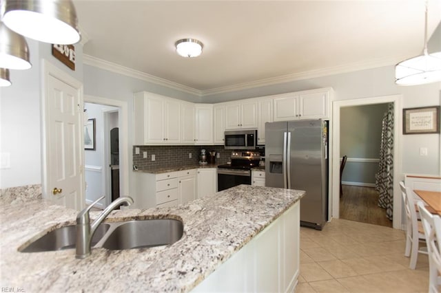 108 Sunrise Bluff Ct, Smithfield, VA 23430 - kitchen featuring appliances with stainless steel finishes, crown molding, light stone countertops, white cabinets, and tasteful backsplash