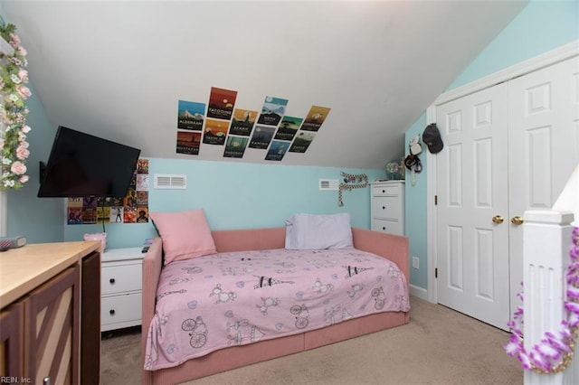 108 Sunrise Bluff Ct, Smithfield, VA 23430 - bedroom featuring light carpet, vaulted ceiling, and a closet
