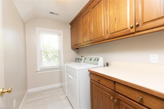 108 Sunrise Bluff Ct, Smithfield, VA 23430 - laundry room featuring independent washer and dryer and cabinet space