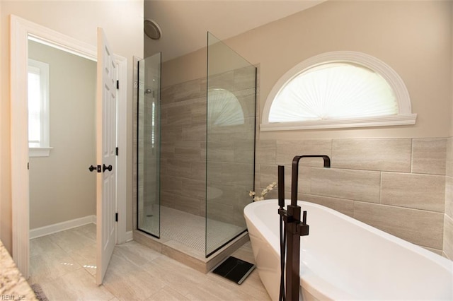 108 Sunrise Bluff Ct, Smithfield, VA 23430 - full bathroom featuring a shower stall and a freestanding bath