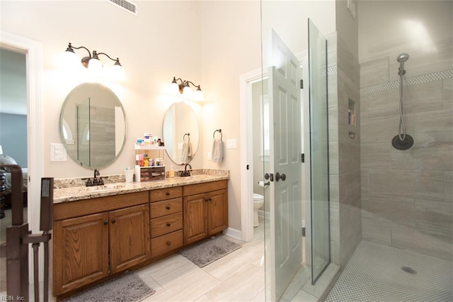 108 Sunrise Bluff Ct, Smithfield, VA 23430 - full bathroom with double vanity, a tile shower, and tile patterned flooring