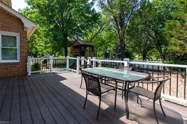 108 Sunrise Bluff Ct, Smithfield, VA 23430 - deck with outdoor dining area and view of wooded area