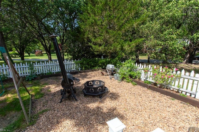 108 Sunrise Bluff Ct, Smithfield, VA 23430 - view of yard with a fire pit