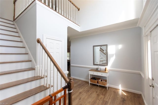 108 Sunrise Bluff Ct, Smithfield, VA 23430 - stairs featuring wood finished floors and ornamental molding