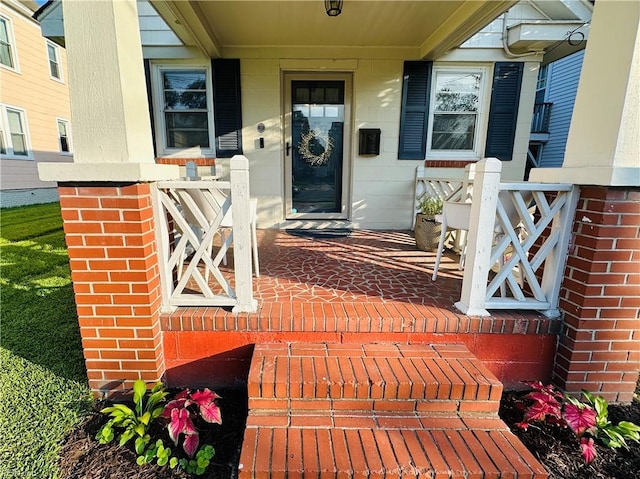 1204 Holly Ave, Chesapeake, VA 23324 - view of exterior entry featuring a porch