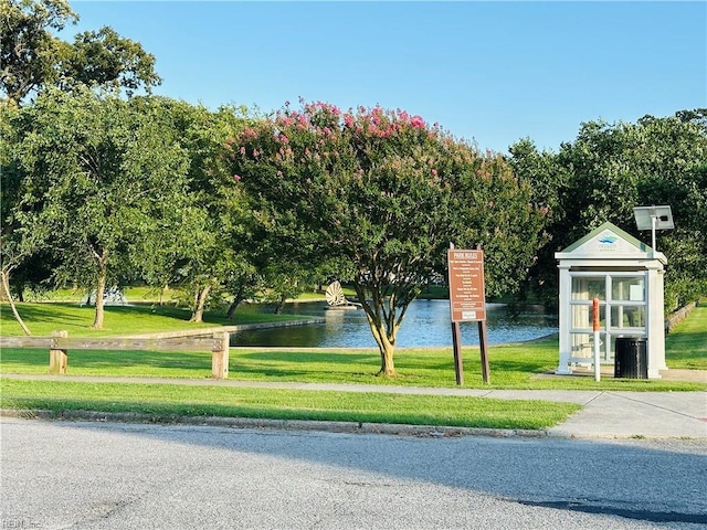 1204 Holly Ave, Chesapeake, VA 23324 - surrounding community with a water view and a lawn