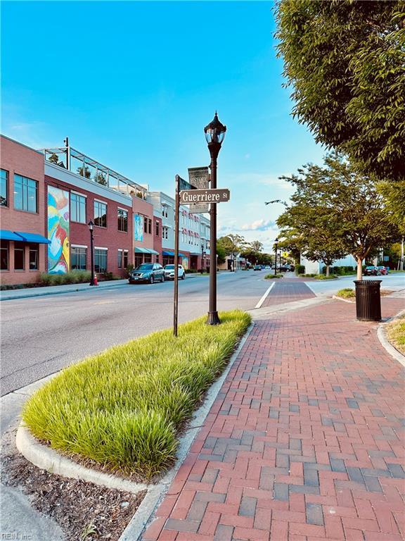 1204 Holly Ave, Chesapeake, VA 23324 - view of asphalt street featuring street lighting, sidewalks, curbs, and a residential view