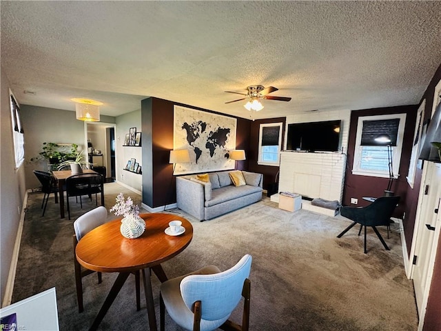 1204 Holly Ave, Chesapeake, VA 23324 - living area with a textured ceiling, carpet flooring, and a ceiling fan