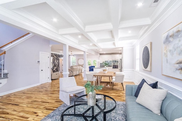 1161 Bells Mill Rd, Chesapeake, VA 23322 - living area featuring light wood finished floors, beamed ceiling, ornamental molding, coffered ceiling, and wainscoting