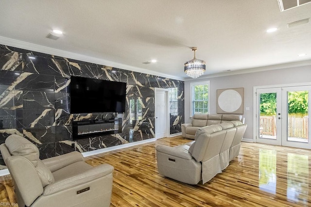 1161 Bells Mill Rd, Chesapeake, VA 23322 - living area with ornamental molding, wood finished floors, recessed lighting, a chandelier, and french doors