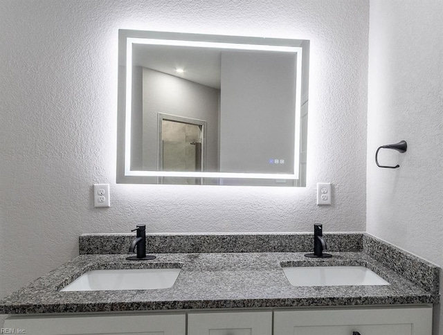 1161 Bells Mill Rd, Chesapeake, VA 23322 - bathroom with double vanity and a textured wall