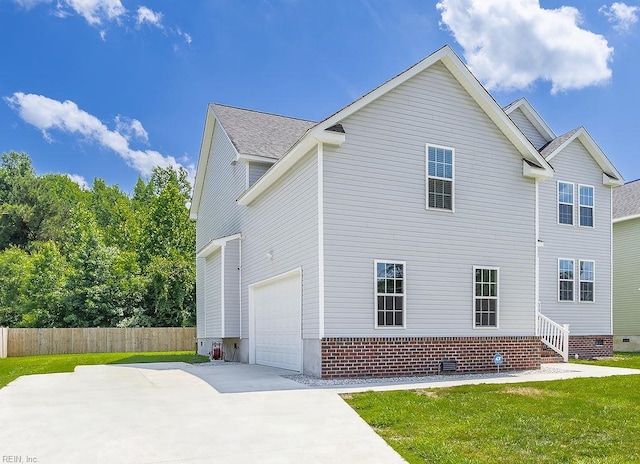 1161 Bells Mill Rd, Chesapeake, VA 23322 - view of home's exterior featuring concrete driveway, an attached garage, and roof with shingles