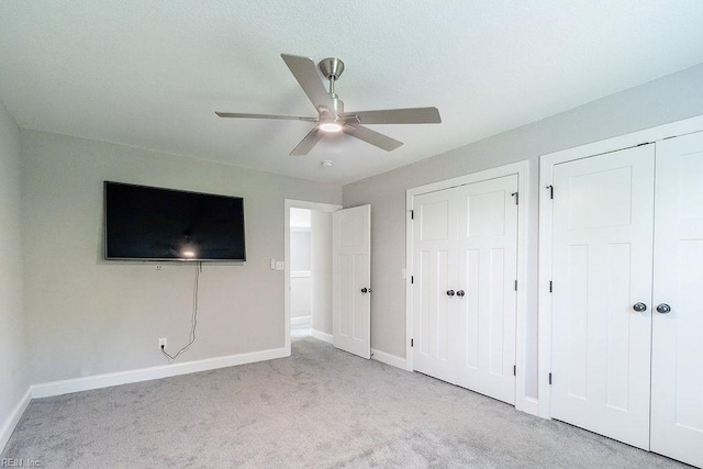 1161 Bells Mill Rd, Chesapeake, VA 23322 - unfurnished bedroom with multiple closets, carpet, and a ceiling fan