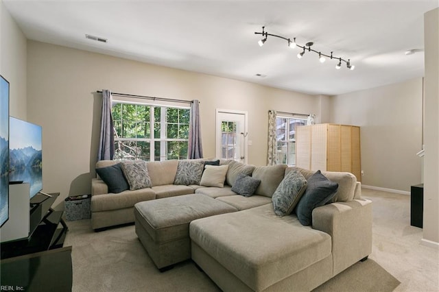 102 Saddle Dr, Newport News, VA 23602 - living room with carpet flooring, healthy amount of natural light, and rail lighting