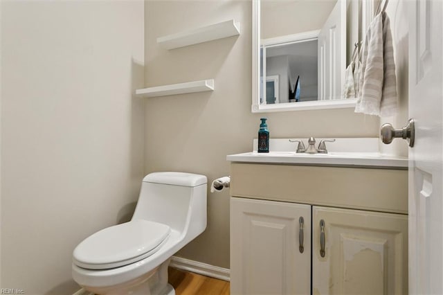 102 Saddle Dr, Newport News, VA 23602 - half bathroom featuring vanity and wood finished floors